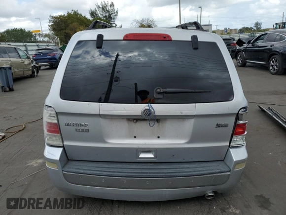 2010 Mercury Mariner Premier with VIN 4M2CN8HG3AKJ06165, listed as a Copart auction lot 50501905 with 229,937 mi miles and Salvage title. Bid and sale history available at DreamBid. Image 6.