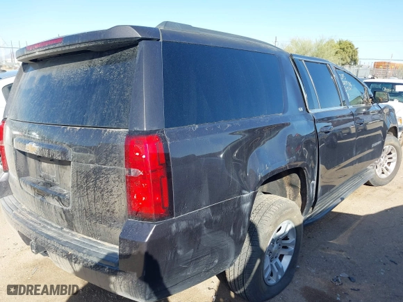 2015 Chevrolet Suburban LT with VIN 1GNSKJKCXFR701284, listed as a IAAI auction lot 41756059 with 1 mi miles. Bid and sale history available at carsss.com. Image 4.
