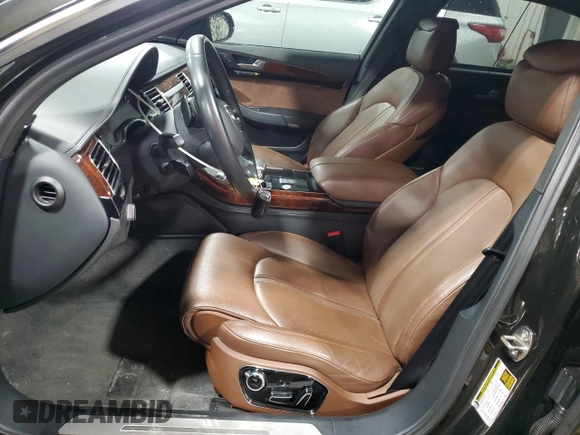 2011 Audi A8 z VIN WAURVAFD8BN005569, wystawiony jako Copart lot #52101065 z przebiegiem 104 893 mil mil oraz Szkody całkowita. Historia ofert i sprzedaży dostępna na DreamBid. Obrazek 7.