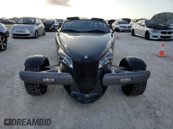 1999 Plymouth Prowler z VIN 1P3EW65G8XV502376, wystawiony jako Copart lot #77556104 z przebiegiem Nie podano mil oraz Szkody całkowita. Historia ofert i sprzedaży dostępna na DreamBid. Obrazek 5.