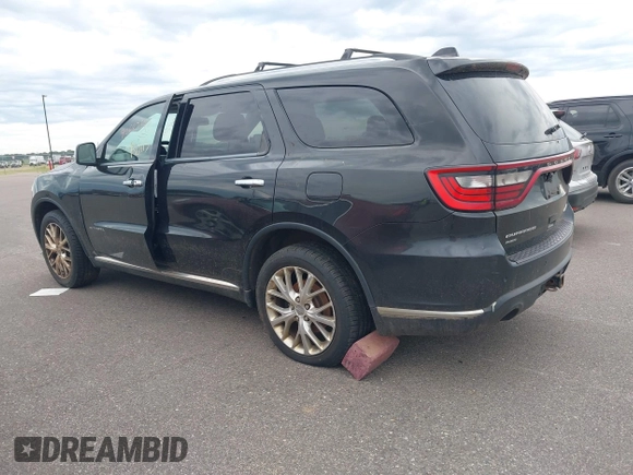 2014 Dodge Durango Citadel with VIN 1C4SDJET5EC314304, listed as a IAAI auction lot 42682540 with 213,651 mi miles and . Bid and sale history available at DreamBid. Image 3.