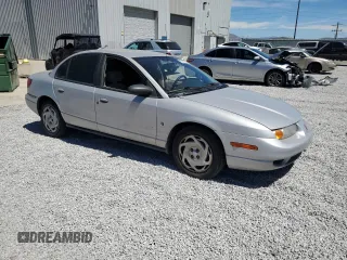 2001 Saturn SL with VIN 1G8ZK52731Z237050, listed as a Copart auction lot 60977394 with Not provided miles and Salvage title. Bid and sale history available at DreamBid. Image 4.
