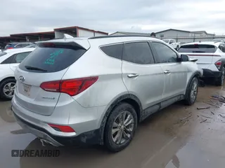 2017 Hyundai Santa Fe Sport 2.0T with VIN 5XYZU4LA4HG437089, listed as a IAAI auction lot 41457614 with 150,277 mi miles. Bid and sale history available at carsss.com. Image 4.