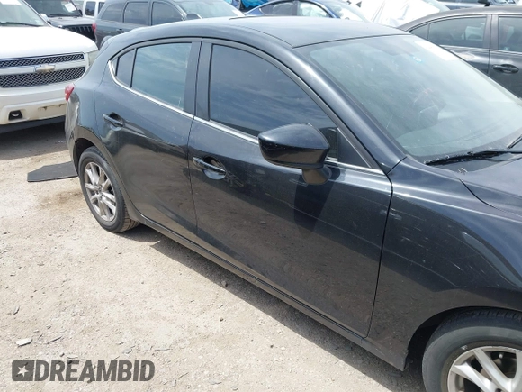 2014 Mazda 3 i Grand Touring z VIN JM1BM1M75E1151329, wystawiony jako IAAI lot #42248334 z przebiegiem 138 748 mil mil oraz . Historia ofert i sprzedaży dostępna na DreamBid. Obrazek 13.