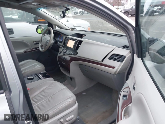 2012 Toyota Sienna XLE with VIN 5TDDK3DC9CS037616, listed as a IAAI auction lot 41435361 with 250,043 mi miles. Bid and sale history available at carsss.com. Image 5.
