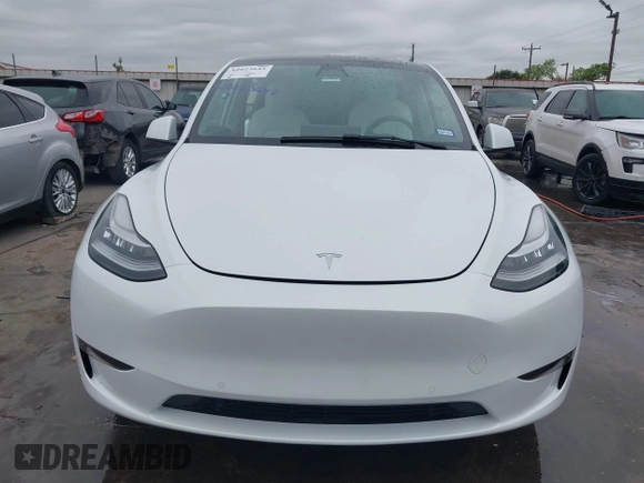 2022 Tesla Model Y Long Range z VIN 7SAYGDEE2NF420882, wystawiony jako IAAI lot #42023642 z przebiegiem 19 783 mil mil oraz . Historia ofert i sprzedaży dostępna na DreamBid. Obrazek 12.