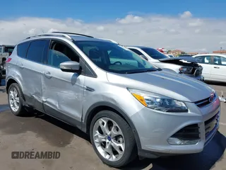 2013 Ford Escape Titanium z VIN 1FMCU0J94DUD84163, wystawiony jako IAAI lot #42406932 z przebiegiem 111 258 mil mil oraz . Historia ofert i sprzedaży dostępna na DreamBid. Obrazek 6.