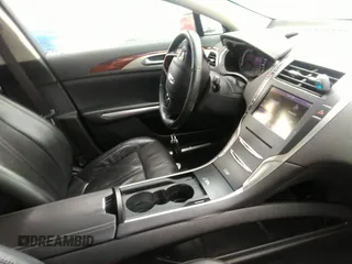 2013 Lincoln MKZ with VIN 3LN6L2JKXDR811822, listed as a IAAI auction lot 42009690 with 128,405 mi miles. Bid and sale history available at carsss.com. Image 5.