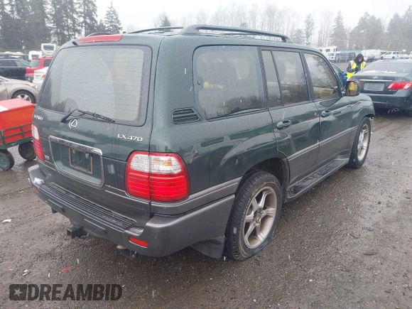 2000 Lexus LX with VIN JT6HT00W3Y0124104, listed as a IAAI auction lot 41493749 with 253,161 mi miles. Bid and sale history available at carsss.com. Image 4.