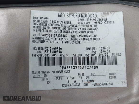2005 Ford Taurus SE with VIN 1FAFP53215A127489, listed as a IAAI auction lot 40940239 with 127,180 mi miles. Bid and sale history available at carsss.com. Image 9.