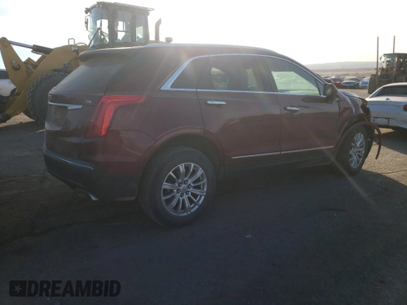 2018 Cadillac XT5 FWD with VIN 1GYKNARS2JZ241702, listed as a Copart auction lot 84031294 with 67,866 mi miles and Salvage title. Bid and sale history available at DreamBid. Image 3.