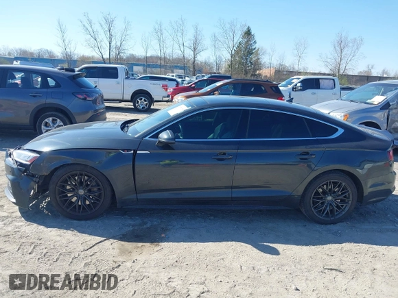 2018 Audi A5 Sportback Premium Plus with VIN WAUENCF53JA132769, listed as a IAAI auction lot 42037673 with 128,040 mi miles. Bid and sale history available at carsss.com. Image 14.