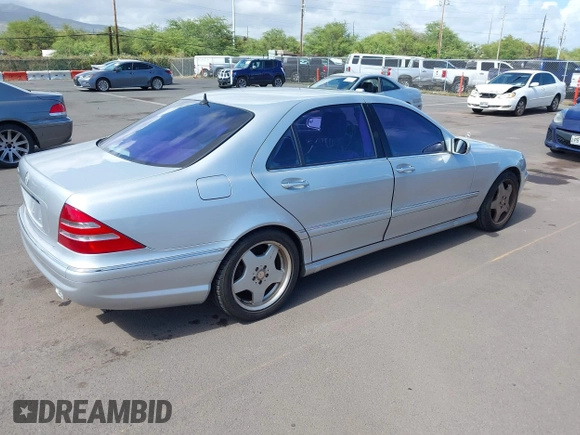 2001 Mercedes-Benz S-Class with VIN WDBNG75JX1A192890, listed as a IAAI auction lot 42088877 with 225,966 mi miles. Bid and sale history available at carsss.com. Image 4.