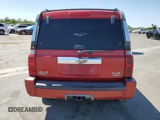 2006 Jeep Commander Limited z VIN 1J8HG582X6C171002, wystawiony jako Copart lot #62952795 z przebiegiem 221 626 mil mil oraz Szkoda całkowita • Salvage title. Historia ofert i sprzedaży dostępna na DreamBid. Obrazek 6.