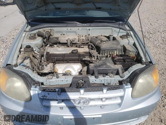2005 Hyundai Accent GLS with VIN KMHCG35C55U341192, listed as a Copart auction lot 70708994 with 174,872 mi miles and Salvage Title. Bid and sale history available at carsss.com. Image 12.