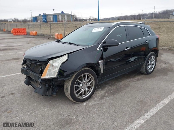 2015 Cadillac SRX Performance Collection with VIN 3GYFNFE35FS546905, listed as a IAAI auction lot 41588405 with 145,620 mi miles. Bid and sale history available at carsss.com. Image 2.