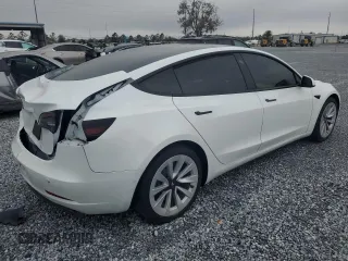 2021 Tesla Model 3 Standard Range Plus z VIN 5YJ3E1EA8MF978095, wystawiony jako Copart lot #45689495 z przebiegiem 44 375 mil mil oraz Szkody całkowita. Historia ofert i sprzedaży dostępna na DreamBid. Obrazek 3.