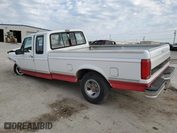 1992 Ford F-150 with VIN 1FTEX15N5NKA30134, listed as a Copart auction lot 76131814 with 213,258 mi miles and Salvage Title. Bid and sale history available at carsss.com. Image 2.