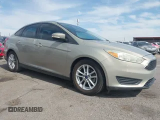 2016 Ford Focus SE z VIN 1FADP3F20GL282582, wystawiony jako IAAI lot #42339164 z przebiegiem 128 420 mil mil oraz . Historia ofert i sprzedaży dostępna na DreamBid. Obrazek 1.