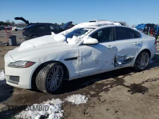 2016 Jaguar XF 35t Prestige with VIN SAJBK4BV3GCY21901, listed as a Copart auction lot 87926165 with 140,124 mi miles and Salvage Title. Bid and sale history available at carsss.com. Image 1.