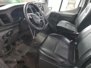 2023 Ford Transit Cargo with VIN 1FTBR3U89PKA70899, listed as a Copart auction lot 77940504 with 62,196 mi miles and Clean Title. Bid and sale history available at DreamBid. Image 7.