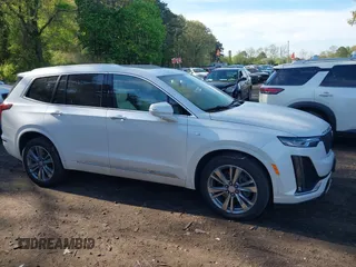 2022 Cadillac XT6 Premium Luxury z VIN 1GYKPDRS3NZ124924, wystawiony jako IAAI lot #42215418 z przebiegiem 32 368 mil mil oraz . Historia ofert i sprzedaży dostępna na DreamBid. Obrazek 13.