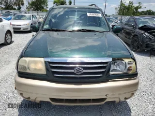 2002 Suzuki Grand Vitara JS z VIN JS3TE62V924151538, wystawiony jako Copart lot #58900085 z przebiegiem 130 514 mil mil oraz Szkoda całkowita • Salvage title. Historia ofert i sprzedaży dostępna na DreamBid. Obrazek 5.