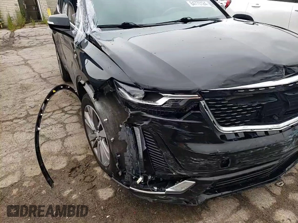 2021 Cadillac XT6 Premium Luxury with VIN 1GYKPDRS9MZ209989, listed as a Copart auction lot 64770124 with 90,115 mi miles and Non Repairable. Bid and sale history available at carsss.com. Image 11.