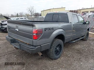 2011 Ford F-150 XLT with VIN 1FTFW1ET4BFC23725, listed as a IAAI auction lot 42018932 with 323,160 mi miles. Bid and sale history available at carsss.com. Image 4.