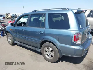 2006 Honda Pilot EX-L with VIN 2HKYF18536H548948, listed as a IAAI auction lot 36572651 with 242,758 mi miles and . Bid and sale history available at DreamBid. Image 3.