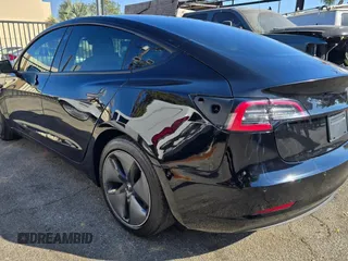 2021 Tesla Model 3 Standard Range Plus with VIN 5YJ3E1EA1MF871146, listed as a Copart auction lot 55633575 with 72,492 mi miles and Salvage Title. Bid and sale history available at DreamBid. Image 3.