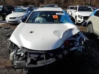 2021 Lexus UX 250h z VIN JTHX9JBH1M2037919, wystawiony jako Copart lot #46970385 z przebiegiem Nie podano mil oraz Szkoda całkowita • Salvage title. Historia ofert i sprzedaży dostępna na DreamBid. Obrazek 5.