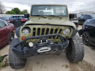 2013 Jeep Wrangler Rubicon z VIN 1C4HJWCG1DL574039, wystawiony jako Copart lot #48728645 z przebiegiem 116 537 mil mil oraz Szkoda całkowita • Salvage title. Historia ofert i sprzedaży dostępna na DreamBid. Obrazek 5.