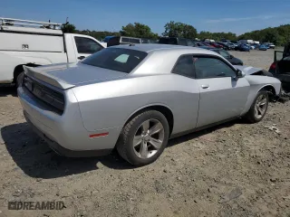 2021 Dodge Challenger SXT with VIN 2C3CDZAG6MH538662, listed as a Copart auction lot 69245164 with 76,227 mi miles and Salvage Title. Bid and sale history available at carsss.com. Image 3.