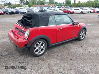 2011 MINI Convertible with VIN WMWZN3C59BTZ89447, listed as a IAAI auction lot 42313009 with 62,009 mi miles and . Bid and sale history available at DreamBid. Image 4.