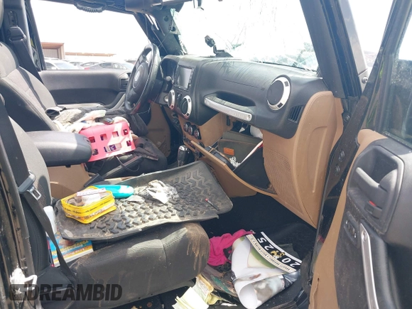 2011 Jeep Wrangler Unlimited Rubicon with VIN 1J4BA6H15BL580301, listed as a IAAI auction lot 42673014 with Not provided miles and . Bid and sale history available at DreamBid. Image 5.