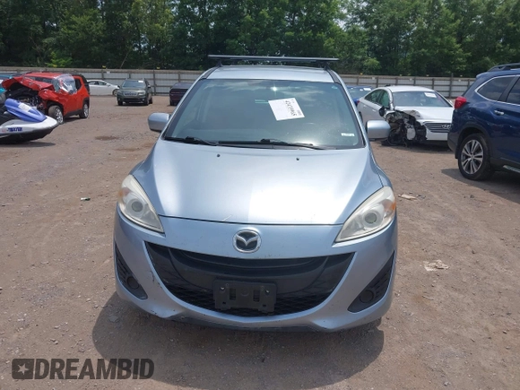2012 Mazda 5 Sport with VIN JM1CW2BLXC0106748, listed as a IAAI auction lot 42435965 with 153,786 mi miles and . Bid and sale history available at DreamBid. Image 6.
