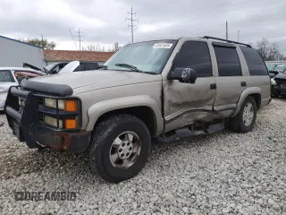 2000 Chevrolet Tahoe Z71 with VIN 1GNEK13R1YR116418, listed as a Copart auction lot 50961645 with 239,452 mi miles and Salvage title. Bid and sale history available at DreamBid. Image 1.