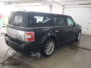 2015 Ford Flex Limited with VIN 2FMHK6D80FBA07985, listed as a IAAI auction lot 41624635 with 150,663 mi miles. Bid and sale history available at carsss.com. Image 4.