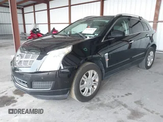2011 Cadillac SRX Luxury Collection z VIN 3GYFNAEY9BS653352, wystawiony jako IAAI lot #42345078 z przebiegiem 118 030 mil mil oraz . Historia ofert i sprzedaży dostępna na DreamBid. Obrazek 2.