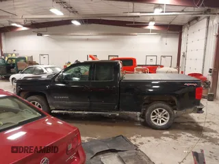 2016 Chevrolet Silverado 1500 LT with VIN 1GCVKREC5GZ176474, listed as a IAAI auction lot 41983780 with 118,587 mi miles and . Bid and sale history available at DreamBid. Image 14.