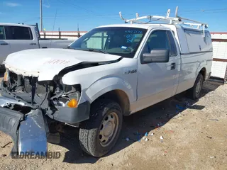 2012 Ford F-150 XL with VIN 1FTMF1CM9CKD33309, listed as a IAAI auction lot 41427178 with 125,029 mi miles. Bid and sale history available at carsss.com. Image 2.