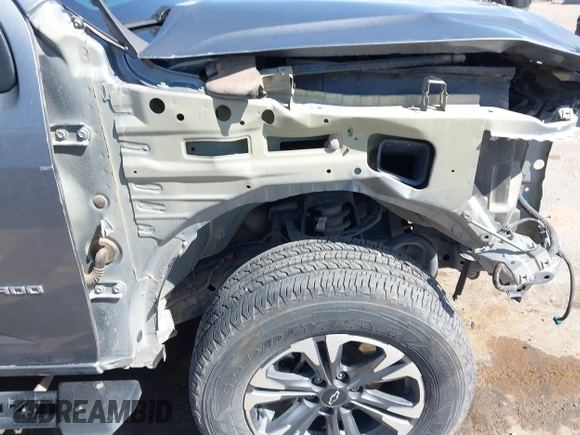 2021 Chevrolet Colorado 4WD Z71 z VIN 1GCGTDEN7M1117558, wystawiony jako IAAI lot #41911673 z przebiegiem 51 838 mil mil oraz . Historia ofert i sprzedaży dostępna na DreamBid. Obrazek 18.