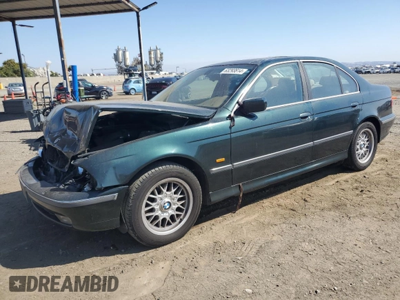 2000 BMW 5 Series 528iA with VIN WBADM6345YGU18707, listed as a Copart auction lot 63293814 with 0 mi miles and Salvage Title. Bid and sale history available at carsss.com. Image 1.