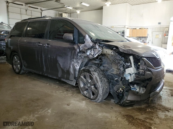 2015 Toyota Sienna SE with VIN 5TDXK3DC6FS545186, listed as a Copart auction lot 55394934 with 201,113 mi miles and Salvage Title. Bid and sale history available at carsss.com. Image 4.