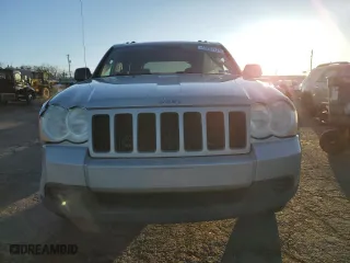 2009 Jeep Grand Cherokee Laredo with VIN 1J8GR48K89C551203, listed as a Copart auction lot 49252125 with 122,071 mi miles and Salvage Title. Bid and sale history available at carsss.com. Image 5.