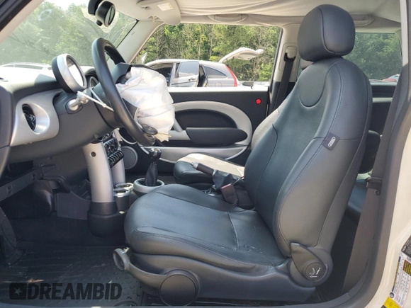 2006 MINI Hardtop с VIN WMWRC33516TK70432, выставлен на аукционе Copart как лот 62157605 с пробегом 139 823 миль миль и Списание • Salvage title. История ставок и продаж доступна на DreamBid. Изображение 7.