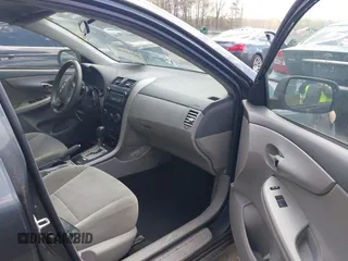 2010 Toyota Corolla with VIN 2T1BU4EE0AC521946, listed as a IAAI auction lot 42049301 with 169,807 mi miles. Bid and sale history available at carsss.com. Image 5.