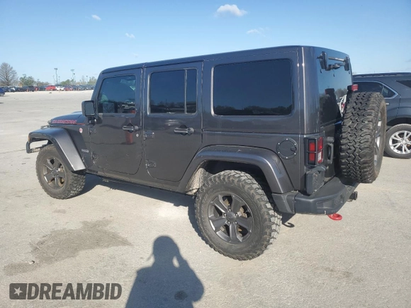 2017 Jeep Wrangler Unlimited Rubicon z VIN 1C4BJWFGXHL737844, wystawiony jako Copart lot #53044635 z przebiegiem 49 286 mil mil oraz Czysty tytuł • Clean title. Historia ofert i sprzedaży dostępna na DreamBid. Obrazek 2.