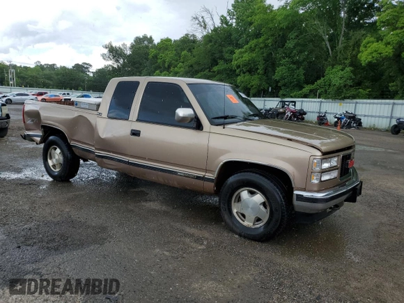 1994 GMC Sierra 1500 z VIN 2GTEK19K3R1574913, wystawiony jako Copart lot #55939635 z przebiegiem 191 240 mil mil oraz Szkoda całkowita • Salvage title. Historia ofert i sprzedaży dostępna na DreamBid. Obrazek 4.